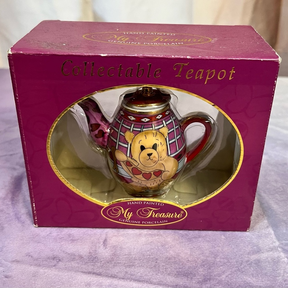 Hand painted porcelain teapot